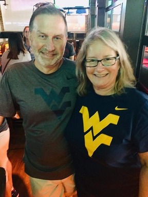 Suzanne Buss and Nick at BIG 12 Kick off 2019.jpg